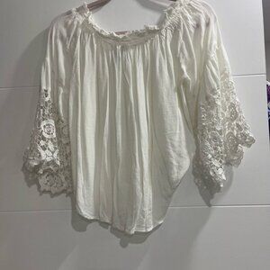 Studio west in Small white off the shoulder